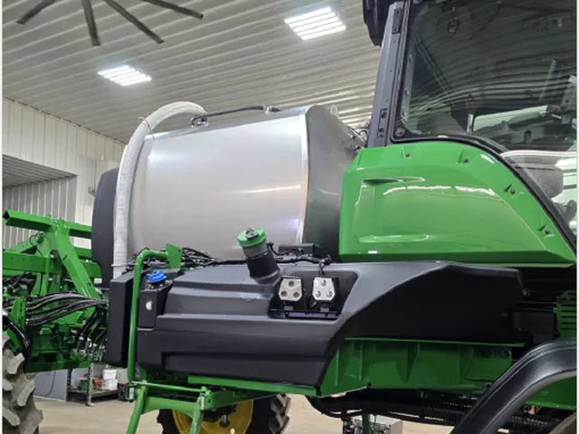 John Deere 410R self-propelled sprayer shown in a preservation dossier